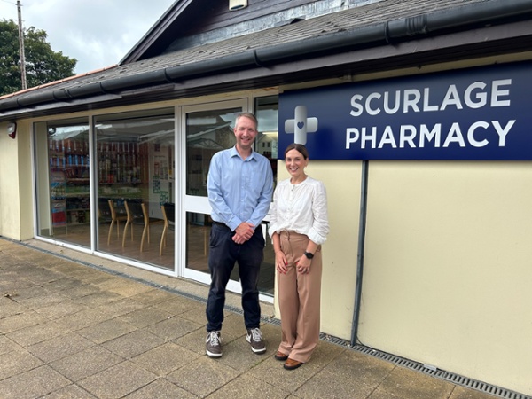 Jonathan and Stacey stood outside the pharmacy