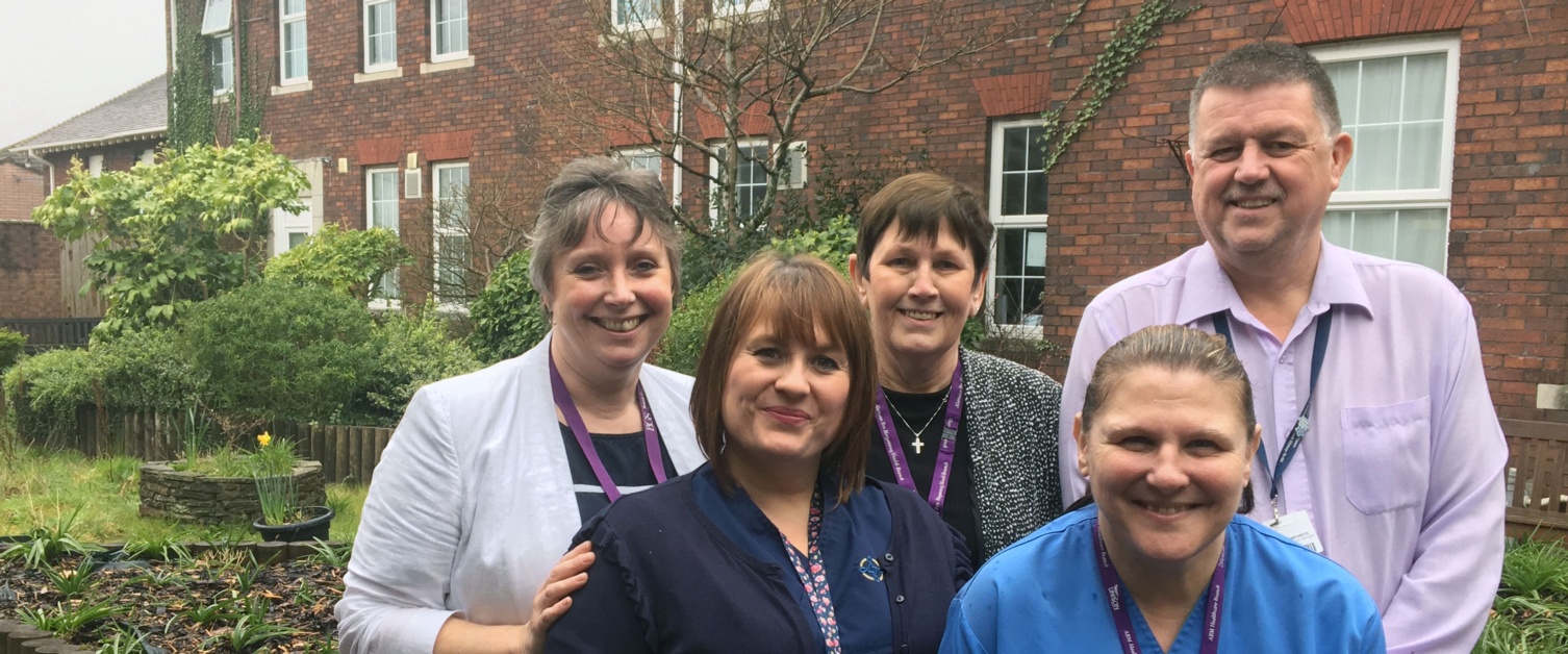 Staff in the garden at Gorseinon Hospital