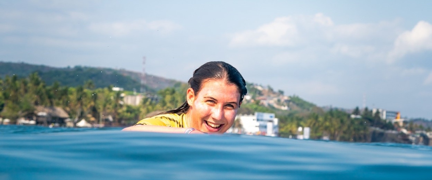 Physiotherapist Ayesha Garvey surfing in El Salvador