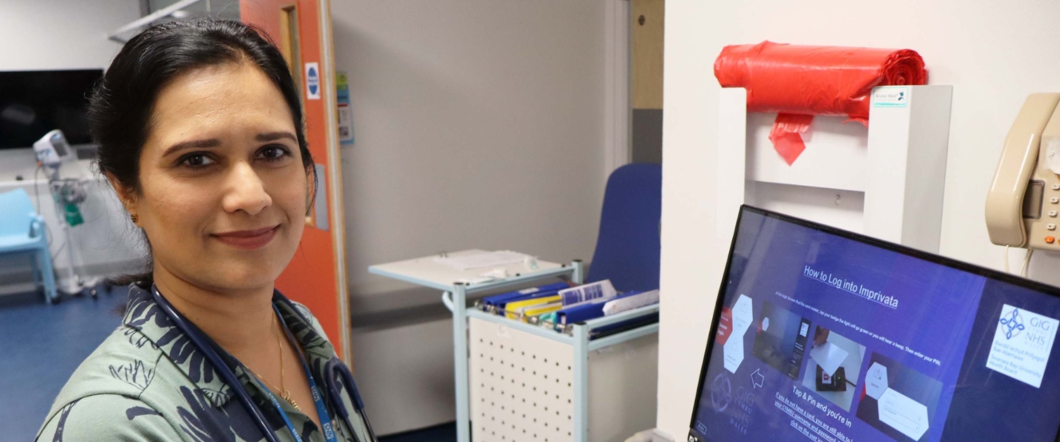 Image shows a doctor on a hospital ward.