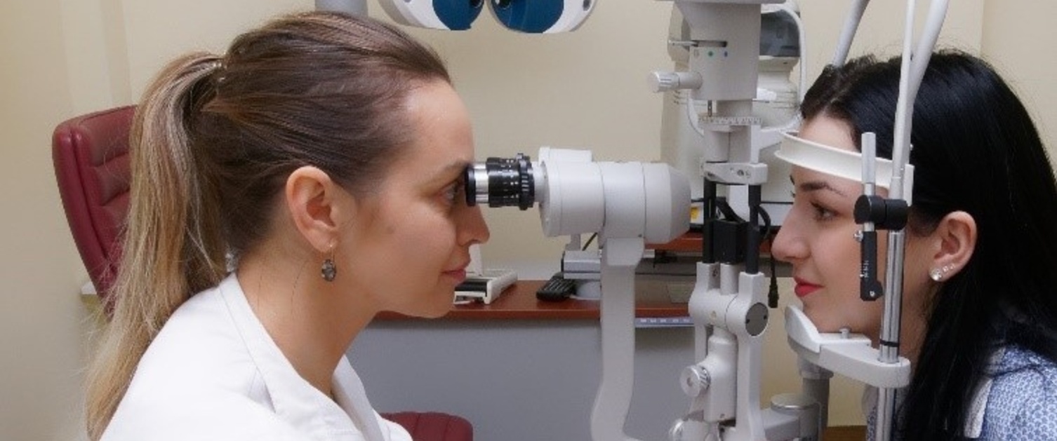 An image of a consultant examining a patient