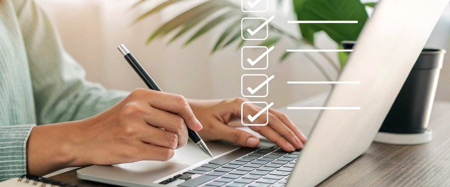 A person typing on a laptop