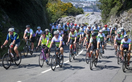 Image shows a group of cyclists
