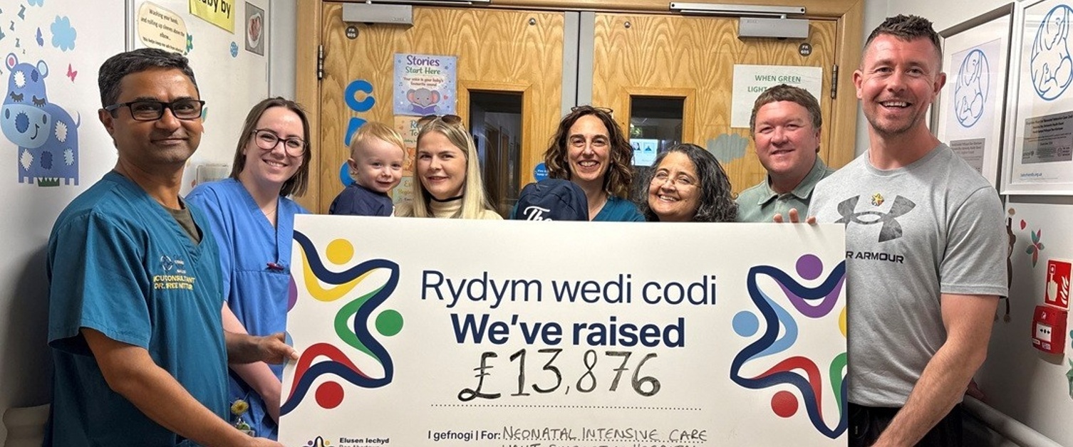 Alex Kiley presents cheque to NICU