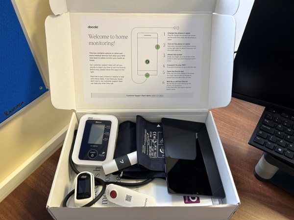 A box containing all of the monitoring devices