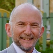 Image shows Alan Fenton smiling.