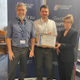 A group image with the award certificate