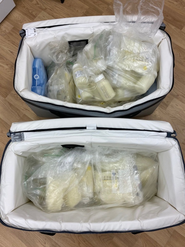 Bottles of donor milk inside a bag