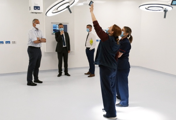 A group of people in an operating theatre