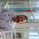 Image shows a man smiling