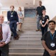 Image shows hospital research team members posing on stairs.