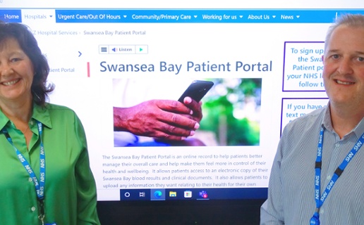 Image shows two people each side of a TV screen displaying the Patient Portal