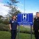 Staff stood next to the Minor Injury Unit sign