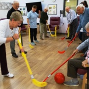 Patients playing walking hockey