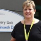 Image shows Jan Worthing outside the Day Surgery Unit