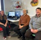 Deborah, Nathan and Ryan sat in an office