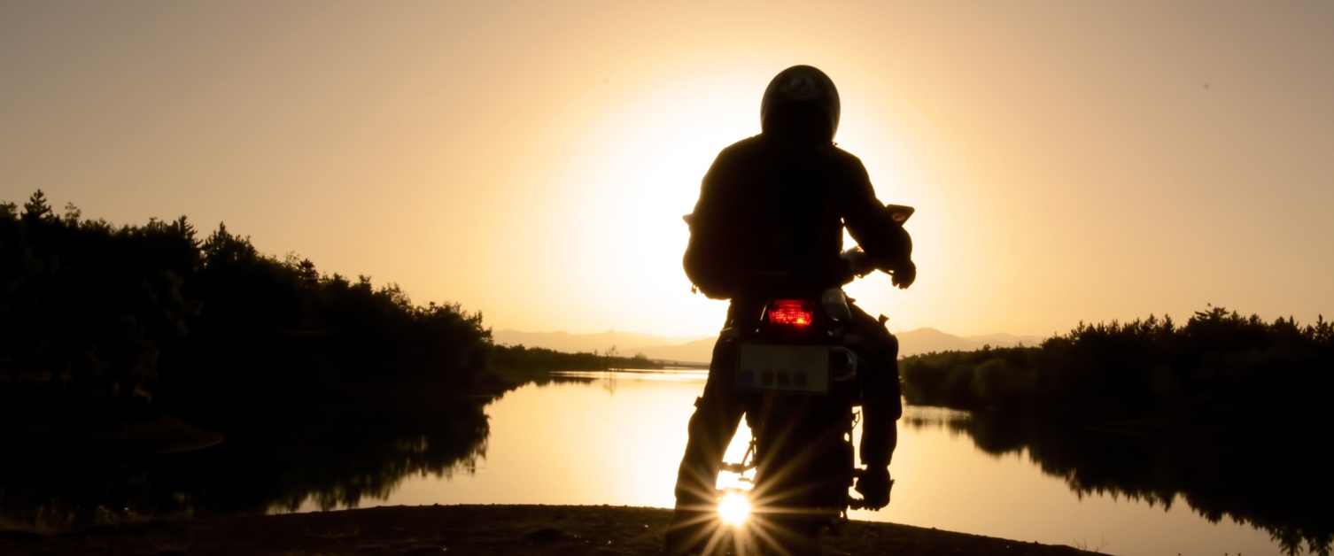 Silhouette of motorcycle rider