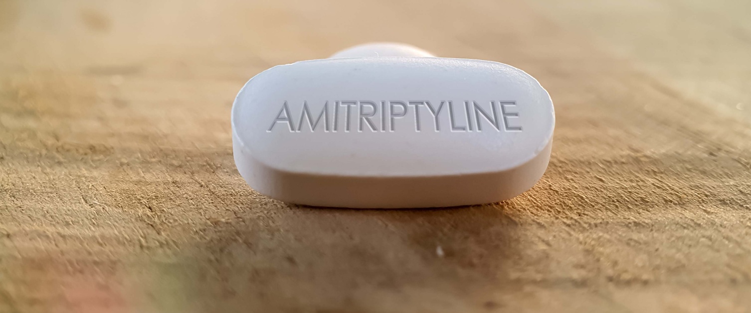 Llun yn dangos un dabled wen wedi