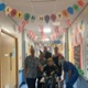 Group in decorated hospital corridor 