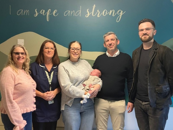 Parents of baby Franklyn Rooke and team who delivered him in ED