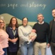Parents of baby Franklyn Rooke and team who delivered him in ED