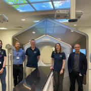 Team with CT Scanner.png