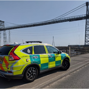 Physicians_Response_Unit_Car_by_transporter_bridge.png