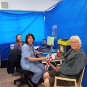 Vaccination team and patient.jpg