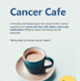 A promotional poster for the Cancer Cafes showing a green mug filled with tea sat on a saucer.