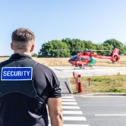 Security at the Grange - Security Officer Jordan Marsh awaiting the arrival of the Air Ambulance Doug Evens ABUHB.jpg