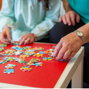 Woman_and_girl_doing_jigsaw.png