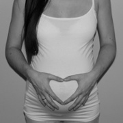 Pregnant_lady_shaping_heart_over_bump.jpg