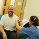 Patient receives flu vaccine from BCUHB nurse
