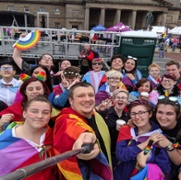 Aled Griffiths with members of GISDA's LGBTQ+ youth club