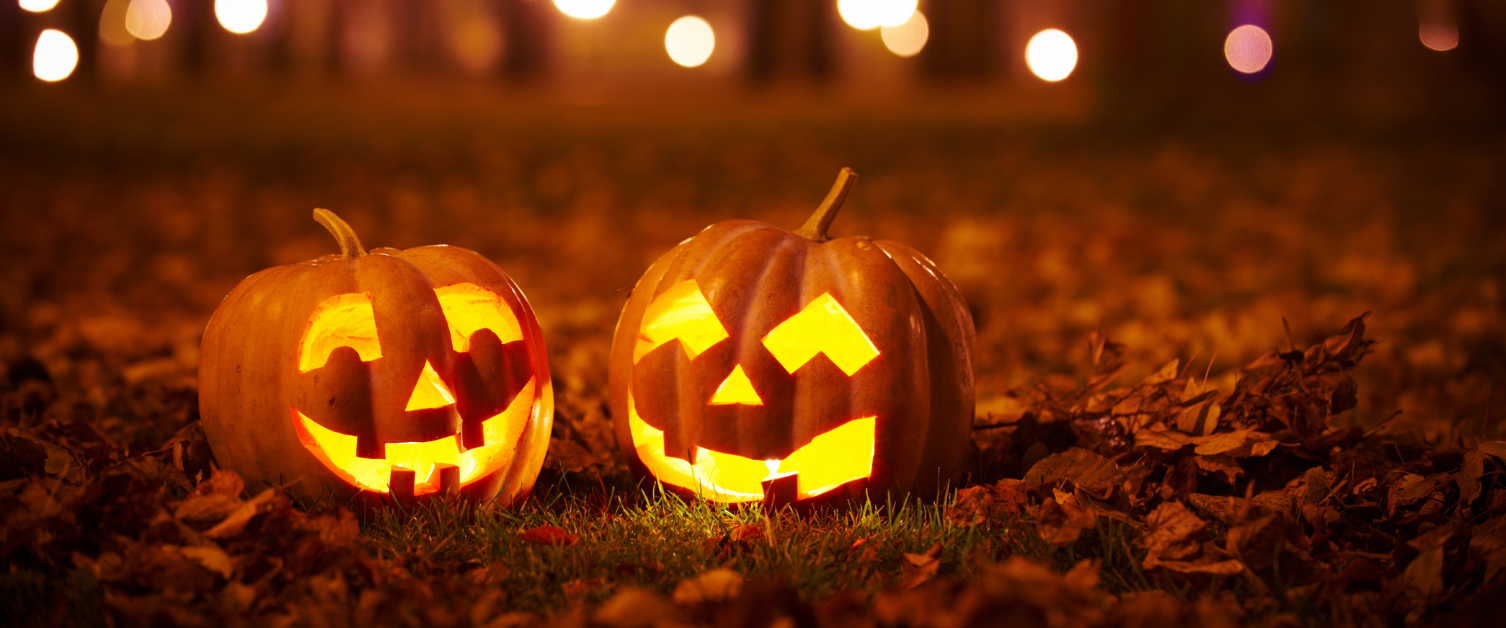 Image of two carved halloween pumpkins.