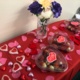 Chocolates and flowers on a table
