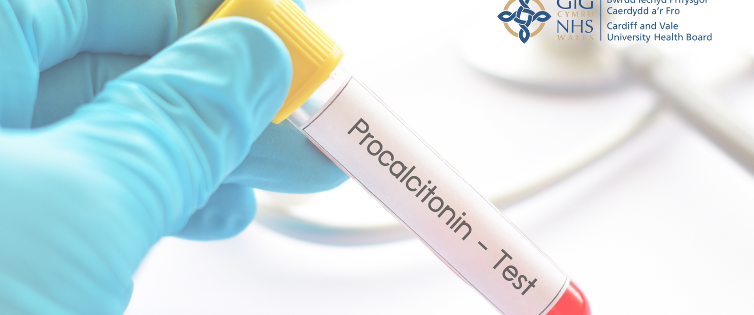 Surgical glove holding blood test tube