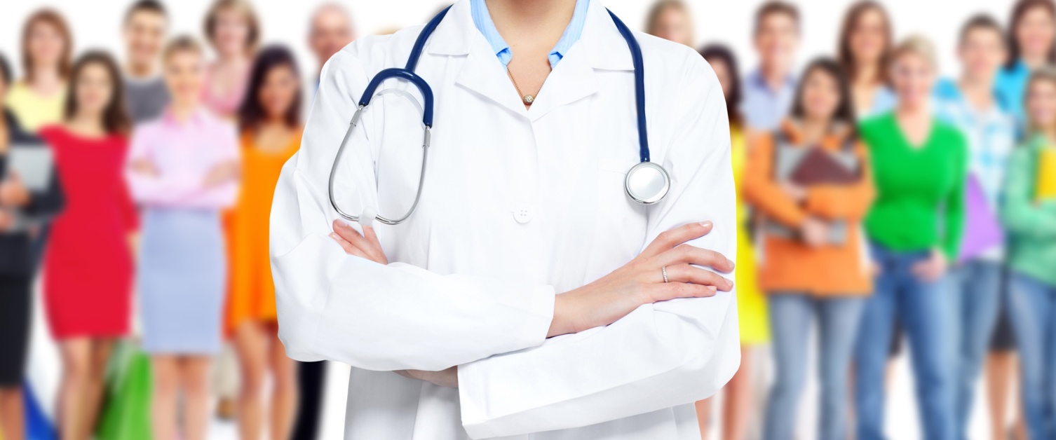 Close up of a doctor in a white lab coat with a stethoscope.