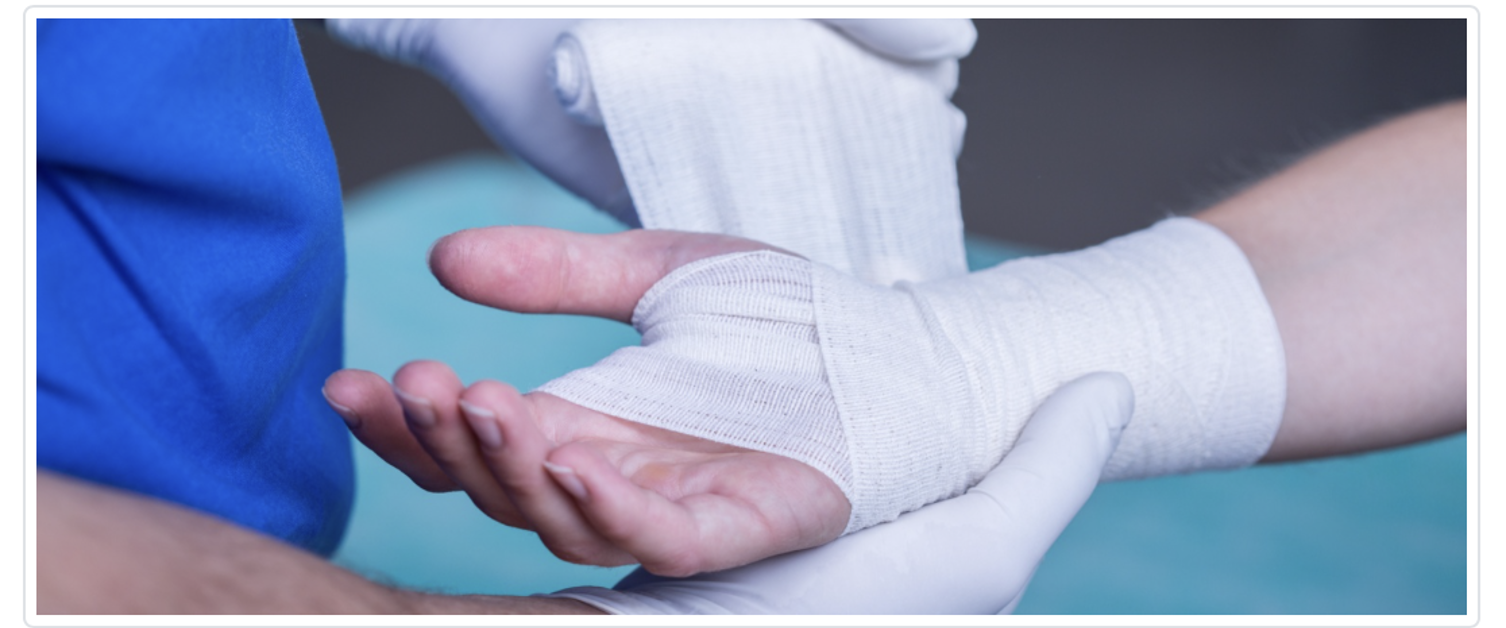 Image of a wrist being bandaged.
