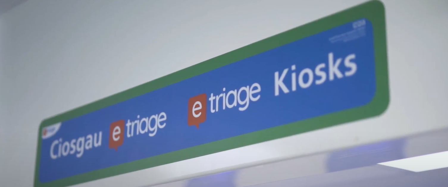 An image of the signage above the eTriage kiosks in the Emergency Unit