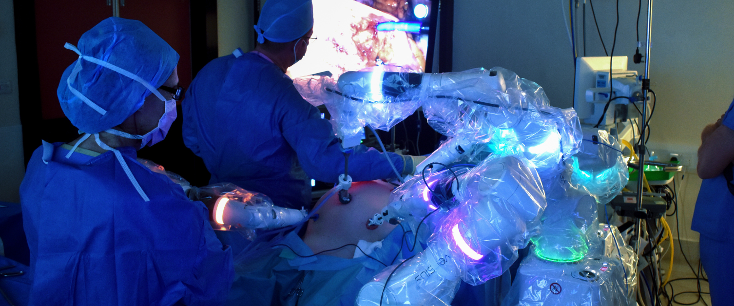 Surgeons completing robotics surgery using the Versius robot