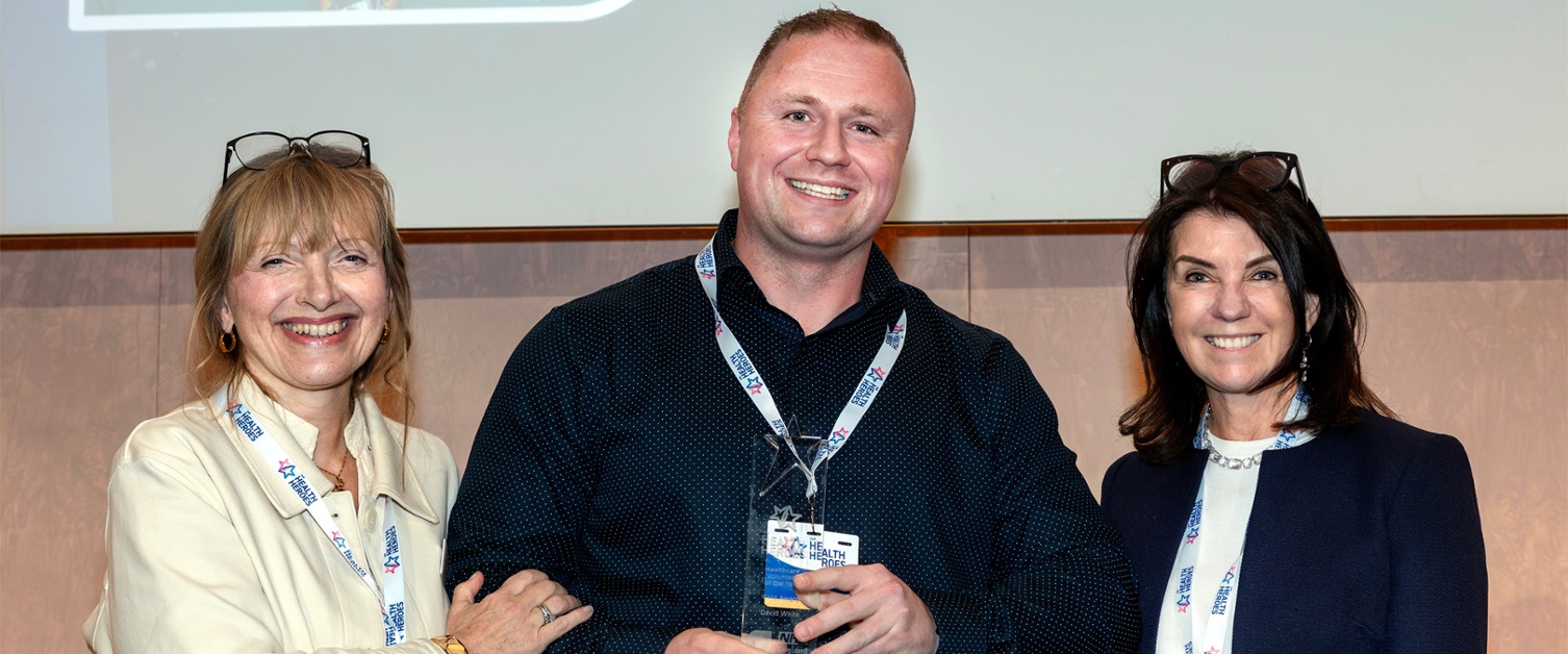 Cardiff hospital patient turned volunteer wins prestigious national award David photographed with Catherine Johnstone CBE (Chief Executive of Royal Voluntary Society) and Dr Dawn Harper (Broadcaster)