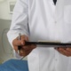 Image of a doctor holding a clipboard