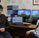 Image of John and Tarig in an office