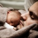 Picture of a father and baby sleeping.