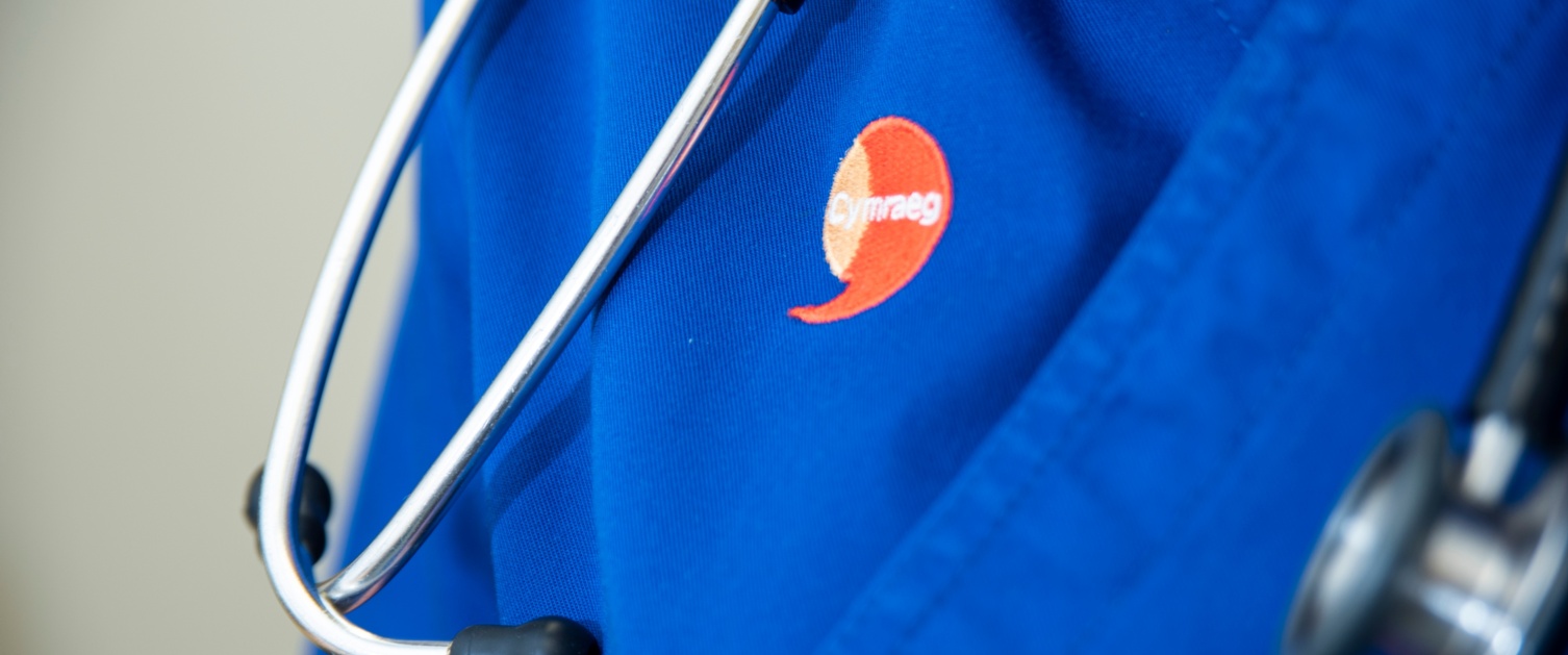 Close up of nurse scrubs with stethoscope