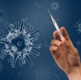 Picture of a needle and a virus.