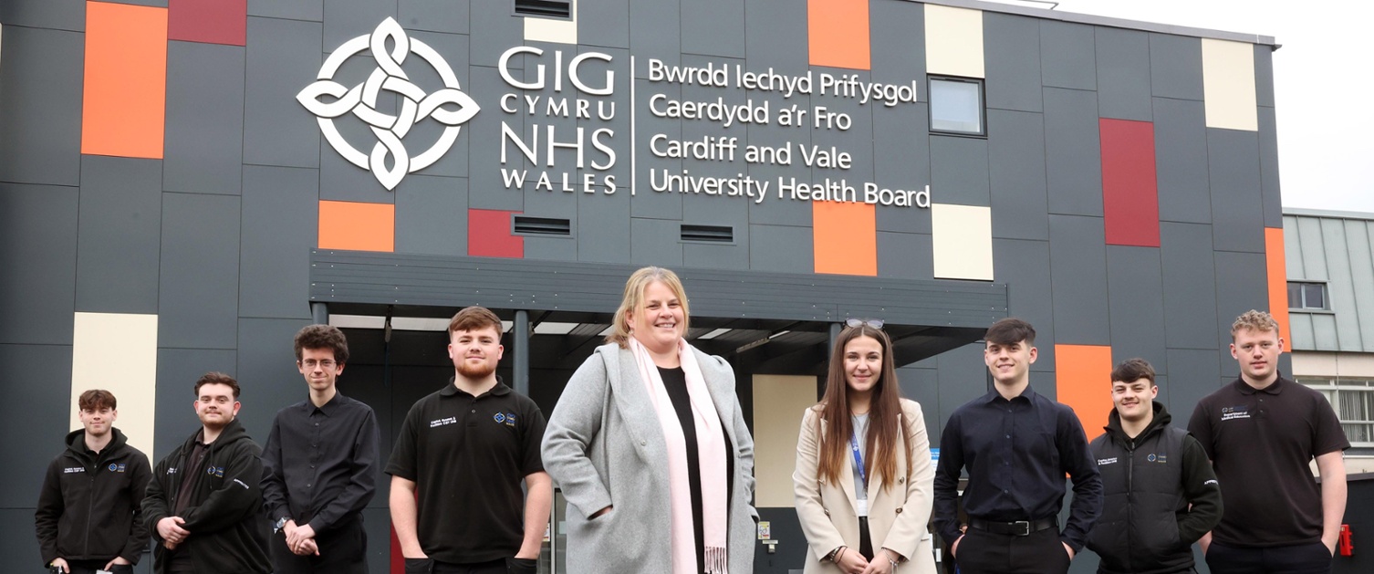 Emma Bendle, apprenticeship and widening access co­-ordinator (centre) and staff and apprentices at Cardiff and Vale University Health Board.
