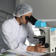 Man on Microscope