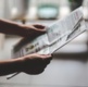 Person reading newspaper